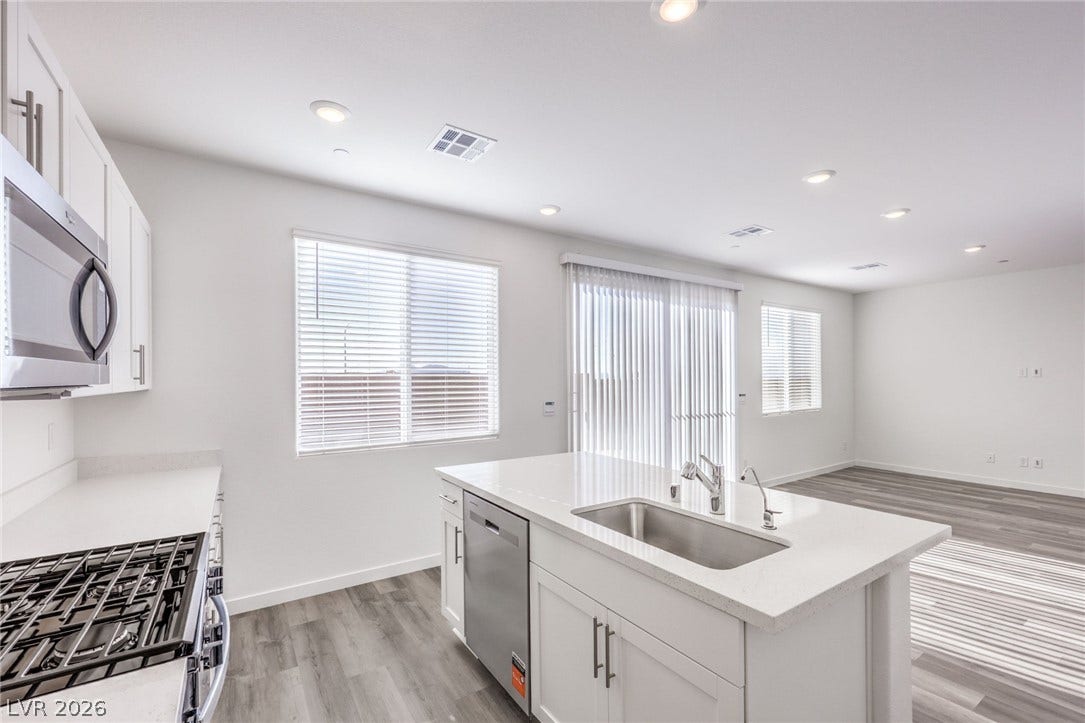 7339 TANYA FALLS Street, North Las Vegas, NV 89084 Photo is of a 1550 Plan Production Home Within the Community- NOT THE ACTUAL HOME FOR SALE *material/features/colors can vary & are subject to change*