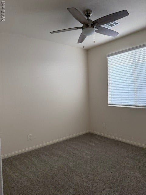 10764 Canary Blossom Avenue, Las Vegas, NV 89129 High ceilings and soft carpeting create a serene atmosphere in this airy room.