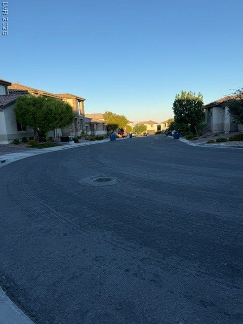 10764 Canary Blossom Avenue, Las Vegas, NV 89129 Quiet neighborhood streets wind through this peaceful residential community.