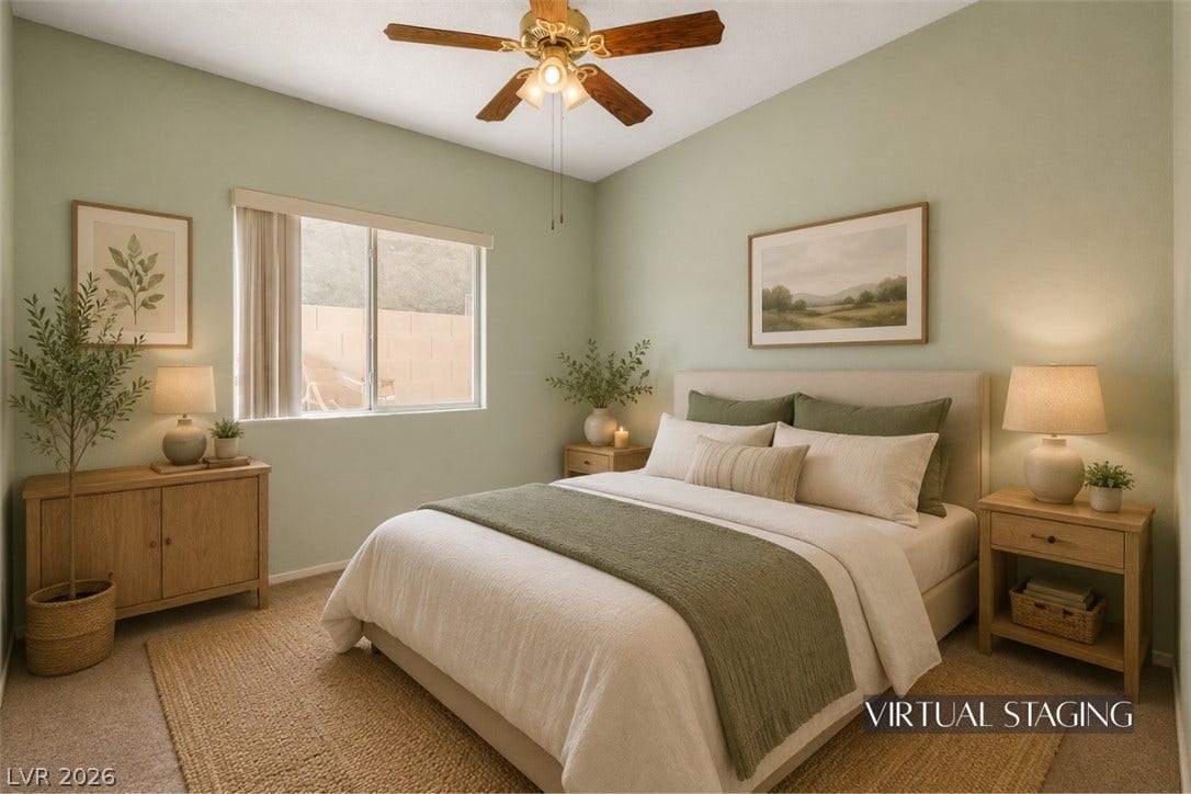 811 Rio Poco Court, Henderson, NV 89015 Smooth carpeting and a sliding window define this inviting bedroom space.