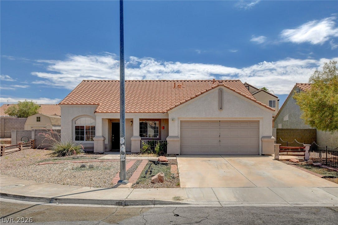 811 Rio Poco Court, Henderson, NV 89015 Clay tile roofing and stucco exterior walls create classic southwest curb appeal.