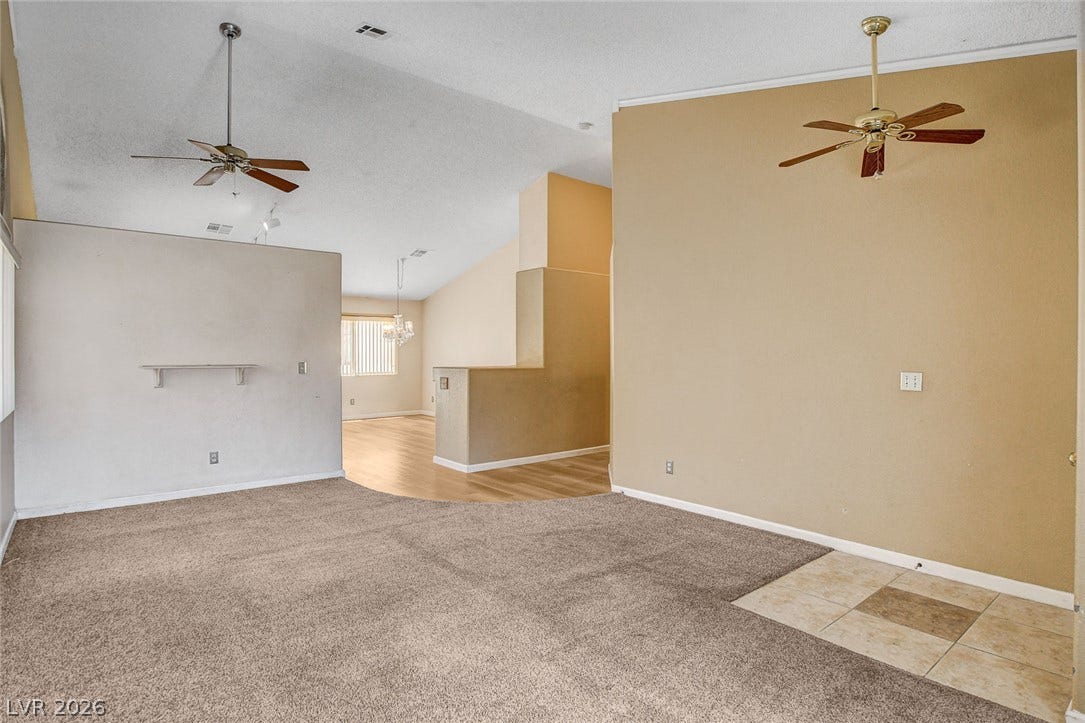 811 Rio Poco Court, Henderson, NV 89015 Vaulted ceilings and an open-concept layout define this versatile, multi-textured living space.
