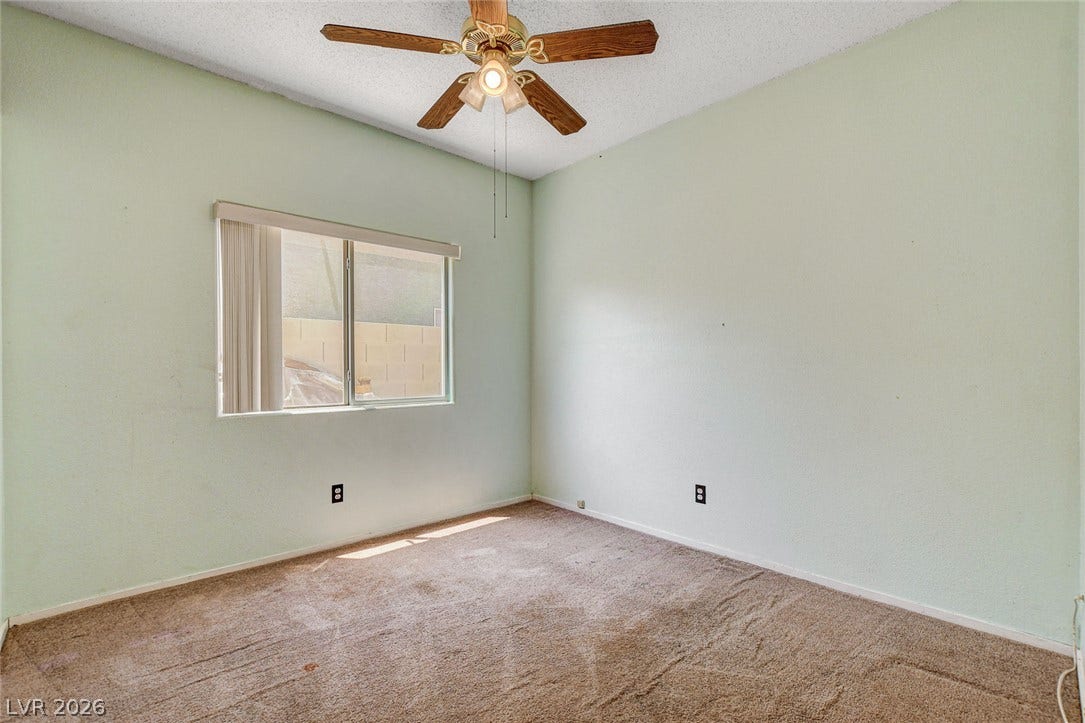 811 Rio Poco Court, Henderson, NV 89015 Soft light filters into this quiet room through a wide window.