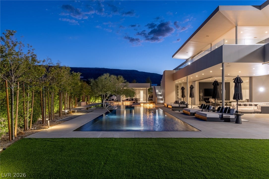 A striking pool and patio area, ideal for twilight entertaining with captivating mountain views.
