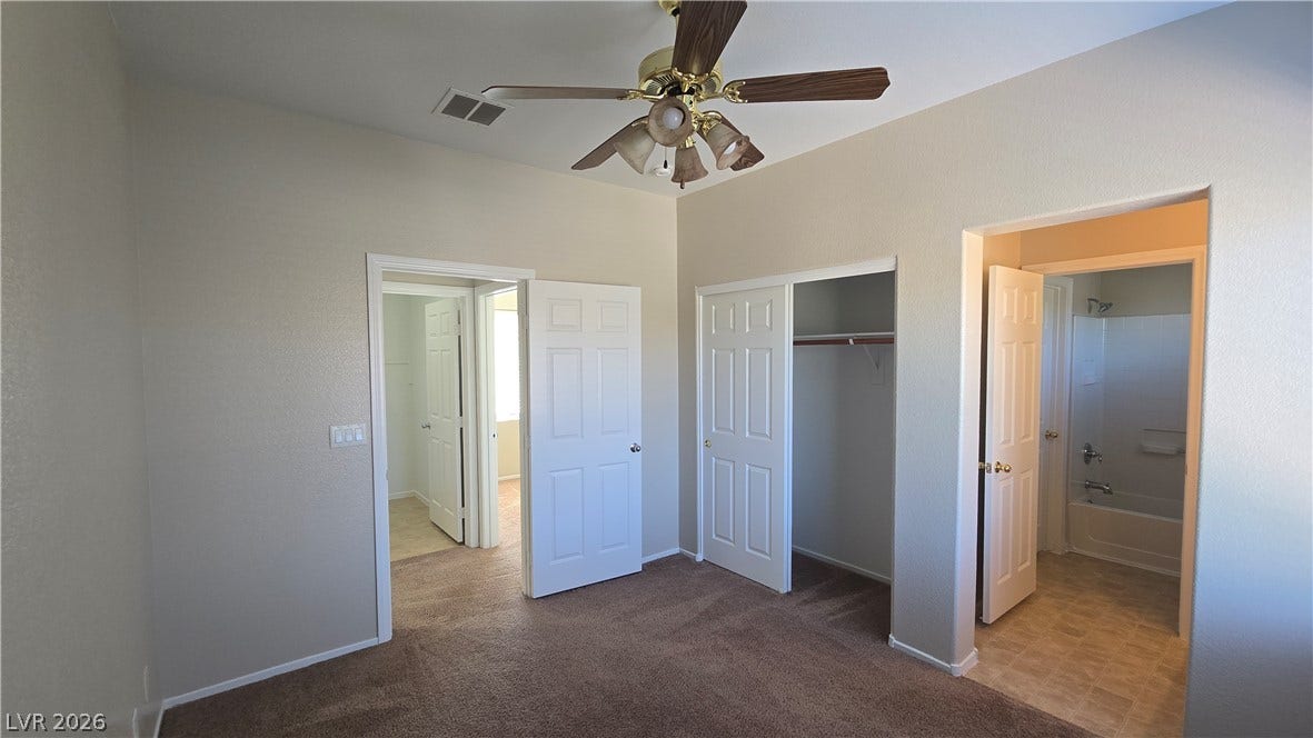 536 Civic Holiday Avenue, North Las Vegas, NV 89031 An inviting bedroom layout transitions smoothly into an adjacent bath and closet space.