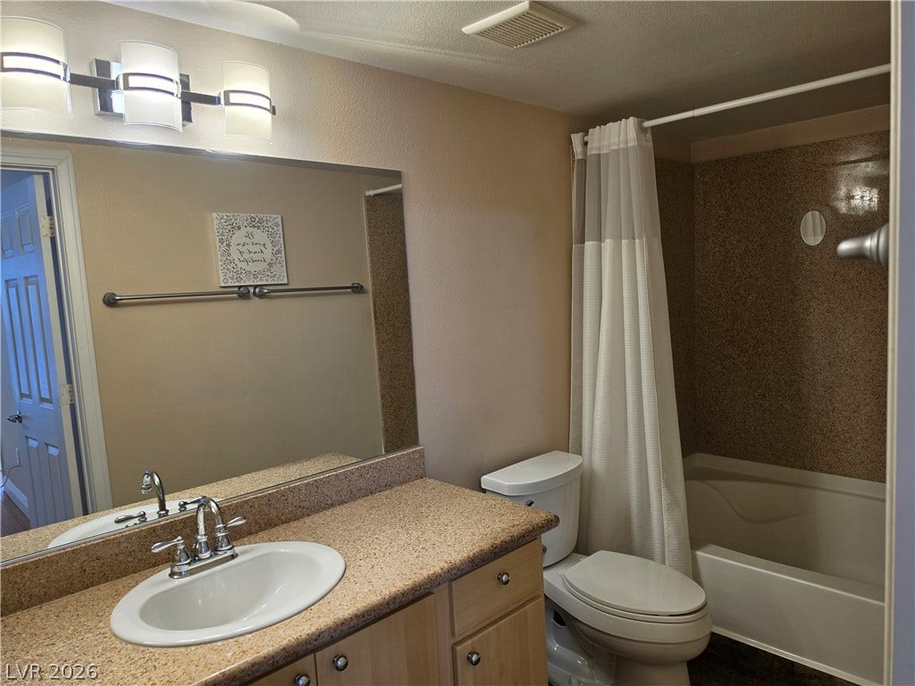 8000 W Badura Avenue, #2111, Las Vegas, NV 89113 A spacious vanity counter pairs perfectly with a classic shower tub combination.