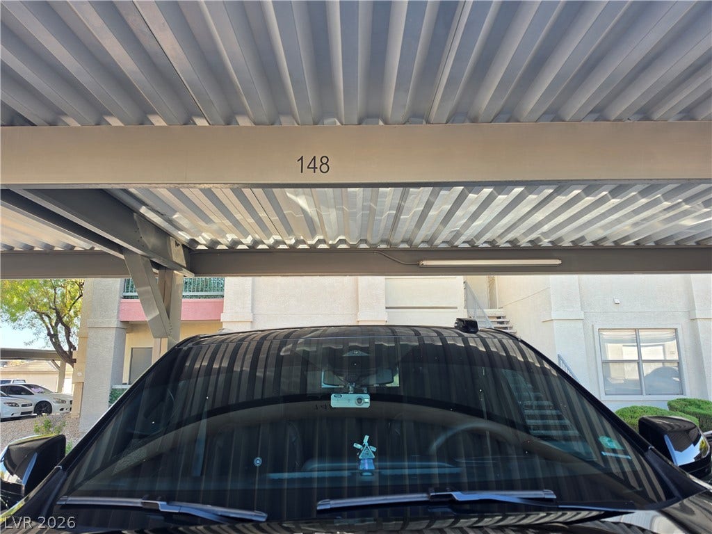 8000 W Badura Avenue, #2111, Las Vegas, NV 89113 A numbered covered parking space protects your vehicle from the elements.