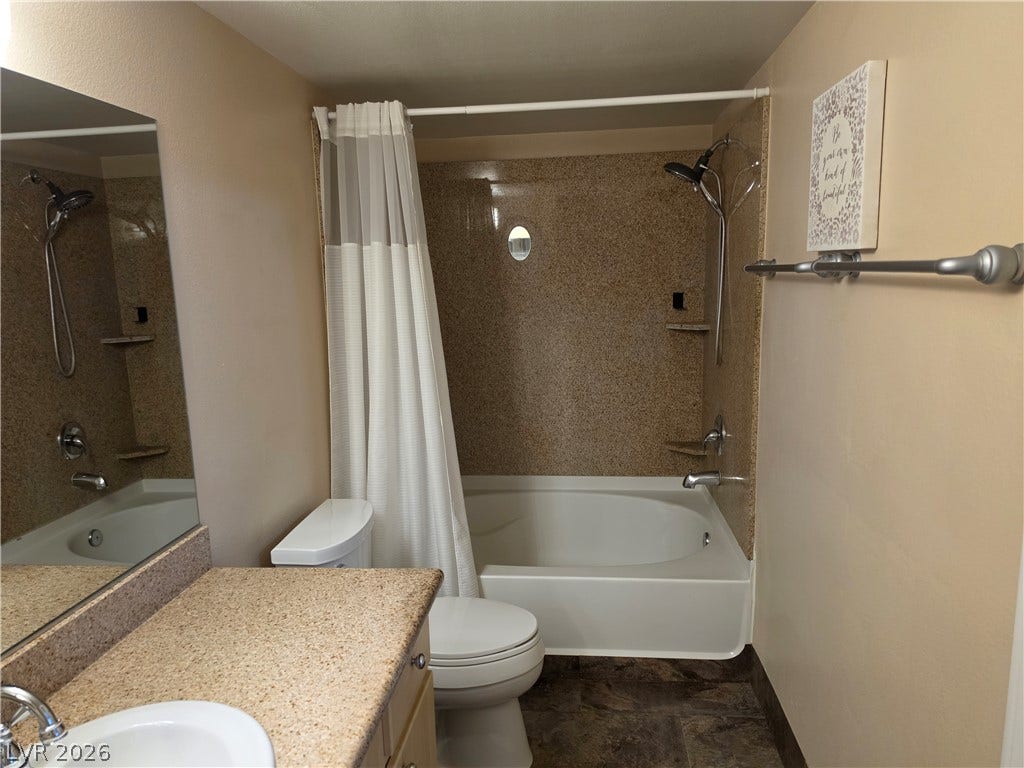 8000 W Badura Avenue, #2111, Las Vegas, NV 89113 A classic bathtub configuration pairs with a matching vanity countertop in this cozy secondary bathroom.