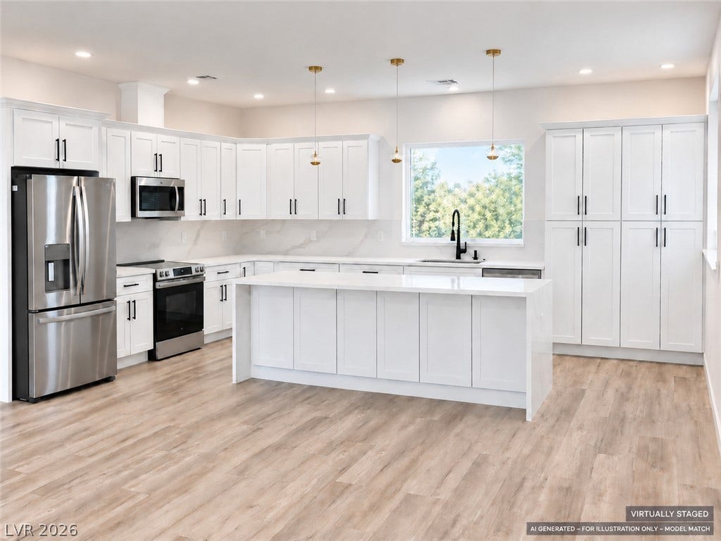 Virtually staged. Crisp cabinetry and a generous center island define this bright, modern culinary workspace.