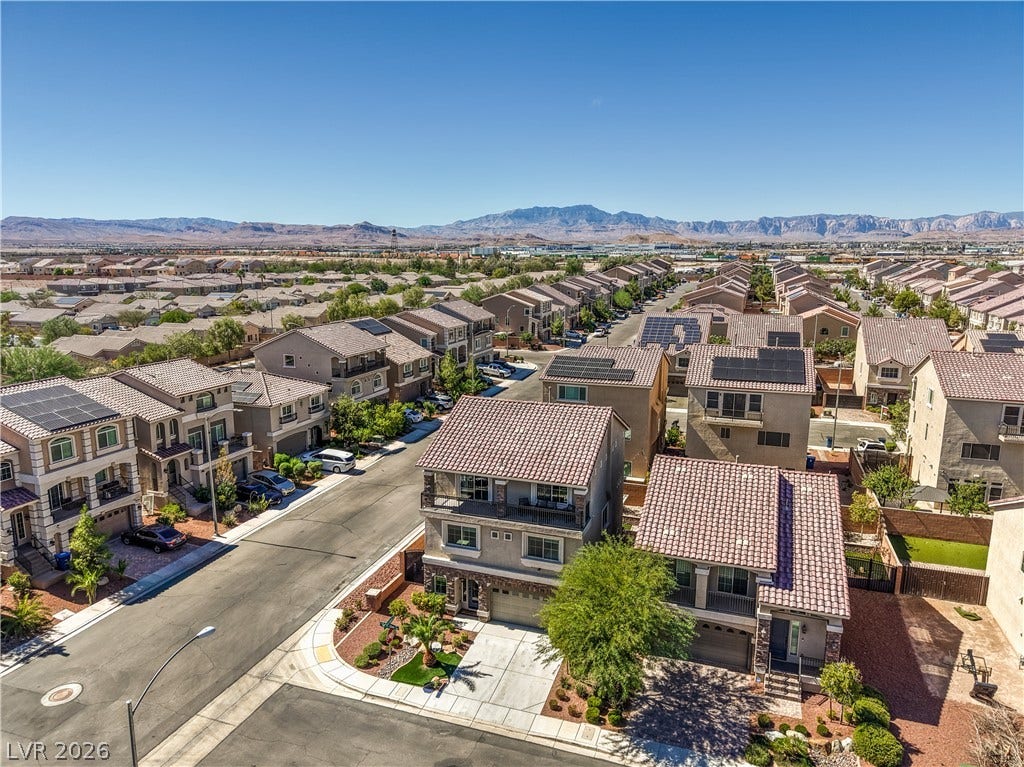 9267 Galen Glen Court, Las Vegas, NV 89139 Distant mountain ranges create a dramatic backdrop for this modern suburban neighborhood.