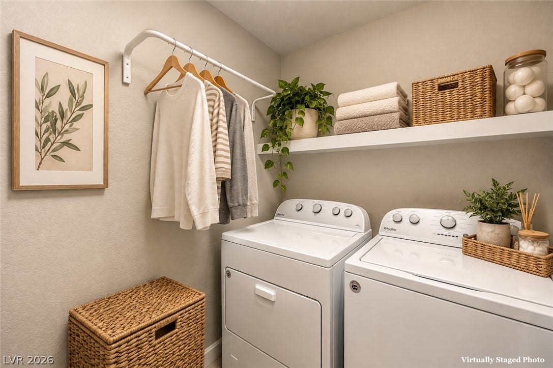 9267 Galen Glen Court, Las Vegas, NV 89139 Functional design highlights this neat utility space featuring a built-in shelf and drying rack.