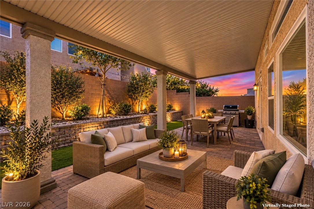 9267 Galen Glen Court, Las Vegas, NV 89139 Sheltered by a solid cover, this spacious paved patio opens to a beautifully landscaped yard.