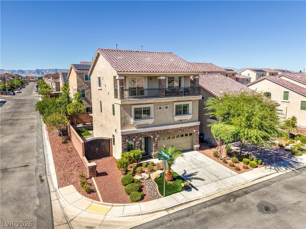 9267 Galen Glen Court, Las Vegas, NV 89139 A classic Spanish tile roof and stone accents elevate this modern corner lot home.