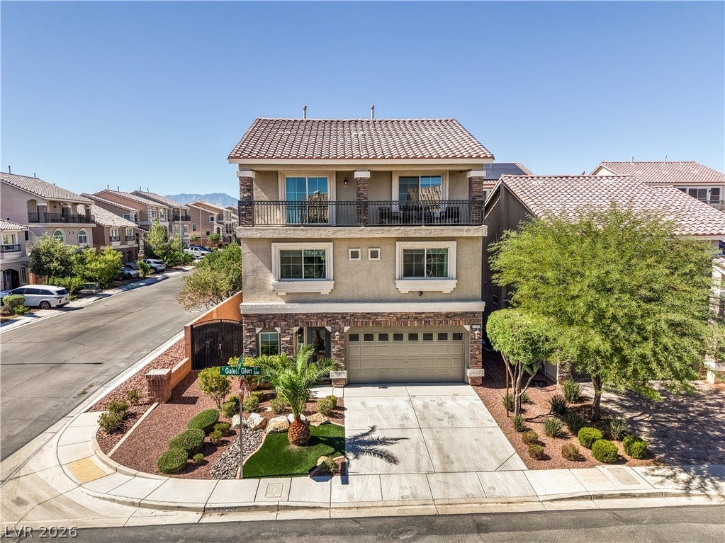 9267 Galen Glen Court, Las Vegas, NV 89139 A classic Spanish tile roof and stone accents elevate this multi-level home's exterior curb appeal.