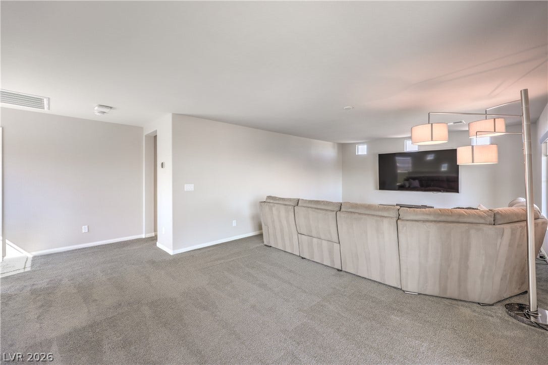 9267 Galen Glen Court, Las Vegas, NV 89139 Smooth walls and plush wall-to-wall carpeting define this versatile upper-level living space.