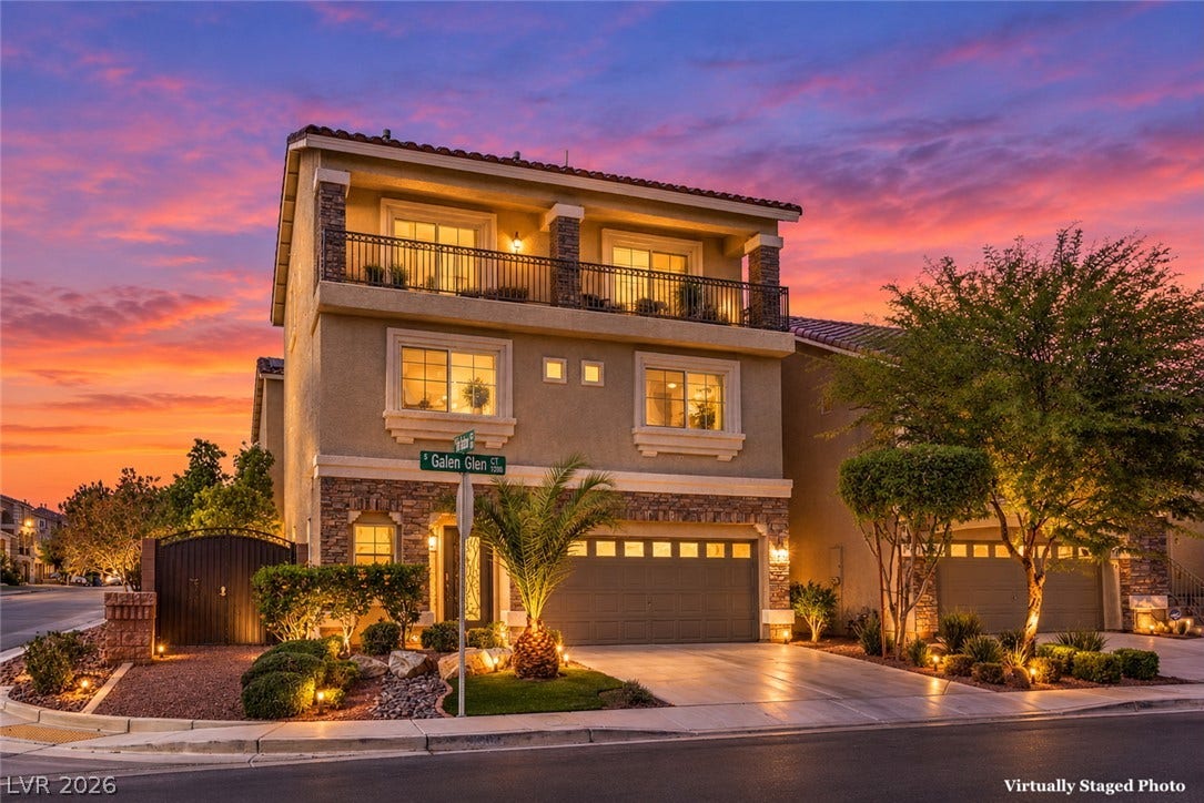 9267 Galen Glen Court, Las Vegas, NV 89139 Stone and stucco accents define this multi-level exterior nestled on a manicured corner lot.
