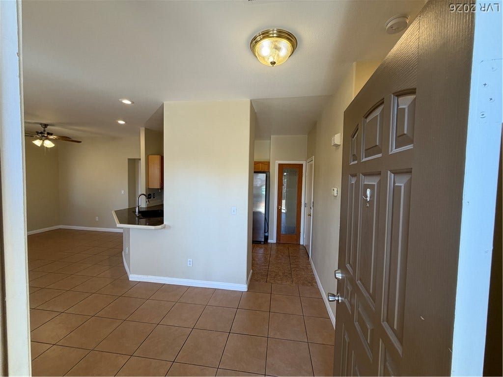 An open floor plan greets guests at the threshold of this home.