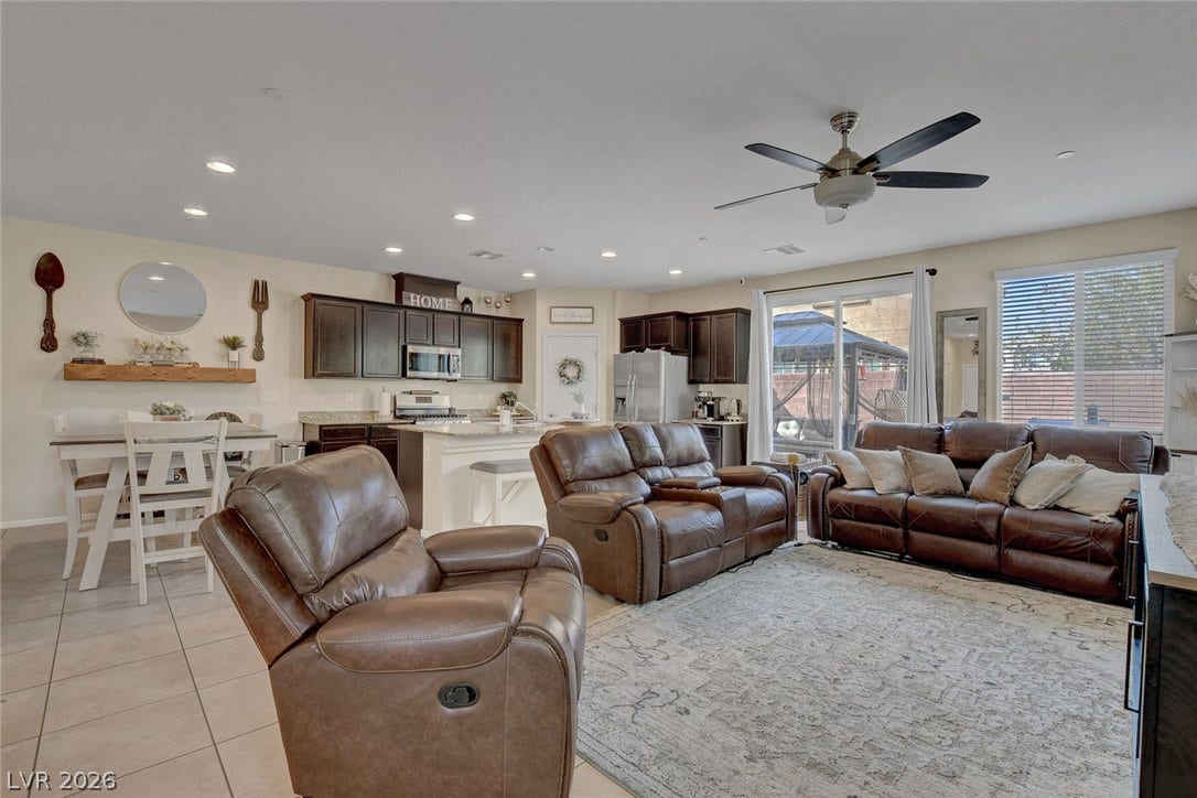 3924 Juanita May Avenue, North Las Vegas, NV 89032 An open floorplan design seamlessly connects the comfortable living area to the adjacent kitchen.
