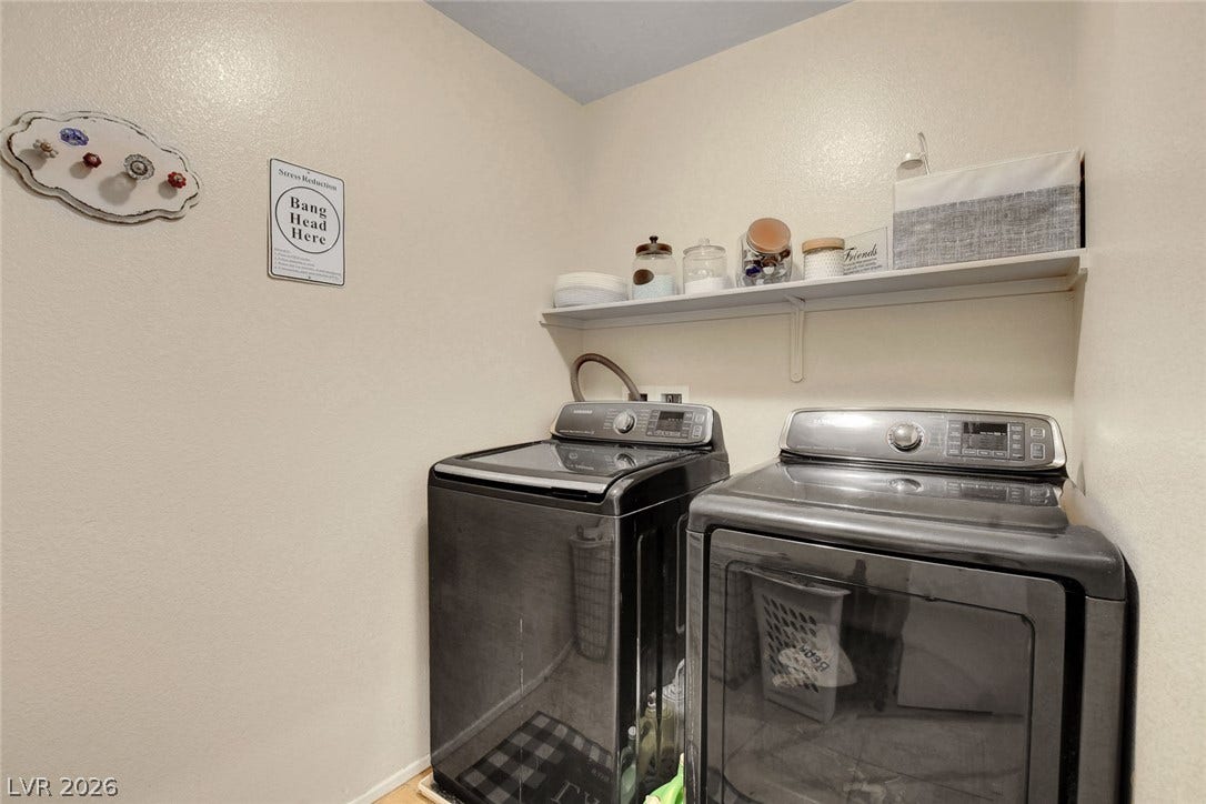3924 Juanita May Avenue, North Las Vegas, NV 89032 Functional design highlights this convenient utility space equipped with overhead shelving and modern appliances.