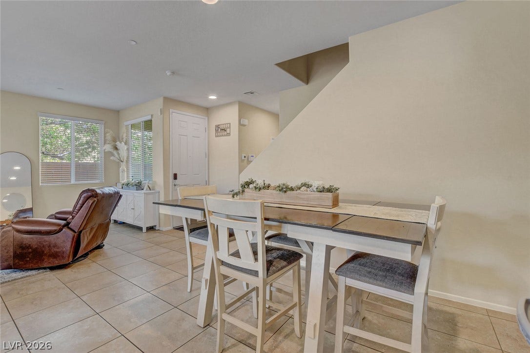 3924 Juanita May Avenue, North Las Vegas, NV 89032 Clean tile flooring and neutral walls define this versatile open dining space near the entryway.