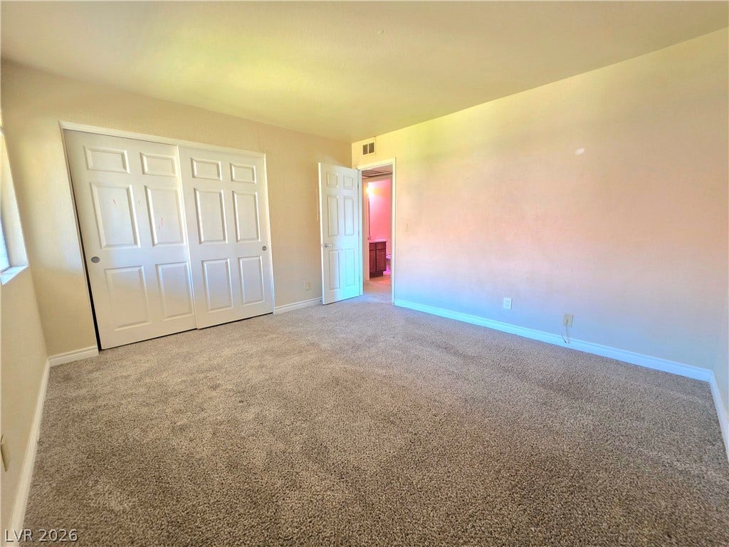 4470 Sandy River Drive, #54, Las Vegas, NV 89103 Plush carpeting and generous closet space define this comfortable bedroom layout.