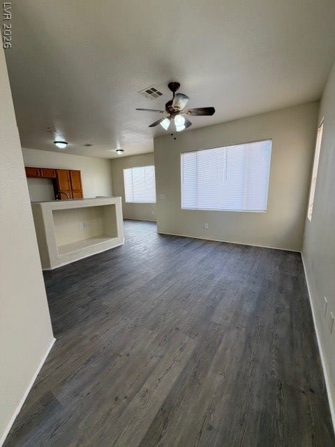 2506 Lady Elizabeth Court, North Las Vegas, NV 89031 Clean lines and wood-style flooring define this airy open-concept living space.