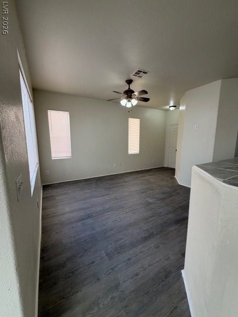 2506 Lady Elizabeth Court, North Las Vegas, NV 89031 Rich wood-look flooring and clean architectural lines define this versatile open living space.