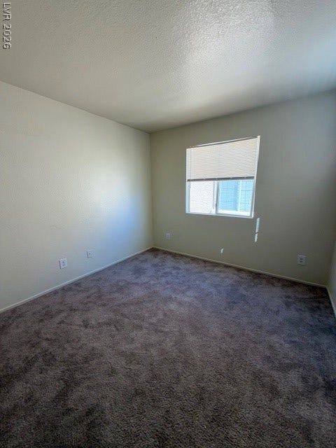 2506 Lady Elizabeth Court, North Las Vegas, NV 89031 Soft carpeting underfoot accents this versatile, light-filled bedroom space.