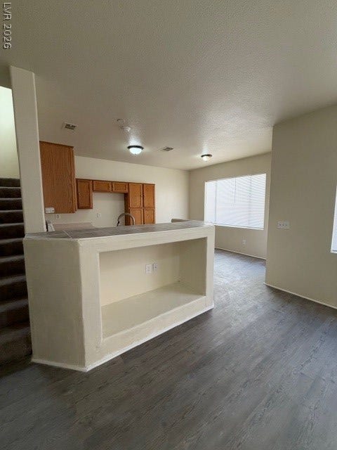 2506 Lady Elizabeth Court, North Las Vegas, NV 89031 An open floorplan seamlessly connects the kitchen area to the main living space.