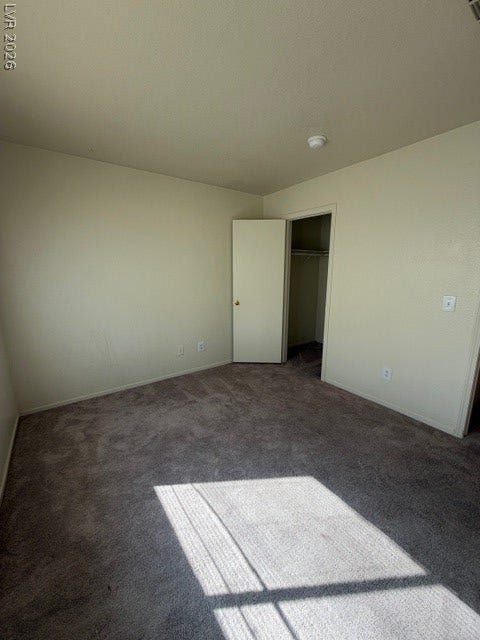 2506 Lady Elizabeth Court, North Las Vegas, NV 89031 Plush carpeting anchors this quiet bedroom space featuring a convenient built-in closet.