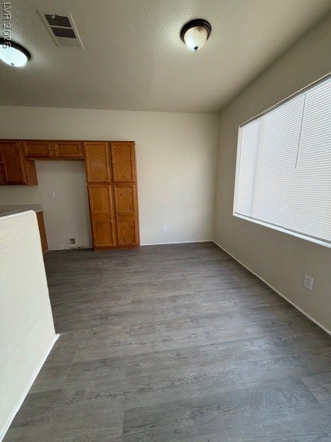 2506 Lady Elizabeth Court, North Las Vegas, NV 89031 High ceilings and a large skylight illuminate this versatile interior space with built-in cabinetry.