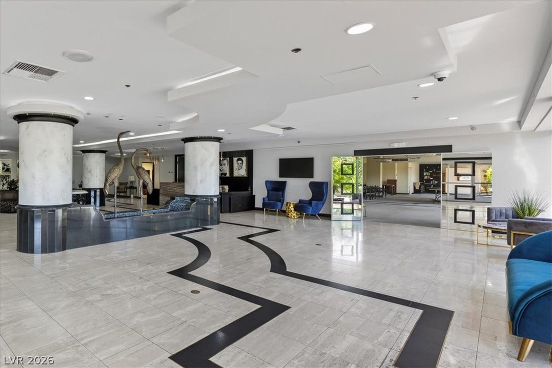 3111 Bel Air Drive, #7D, Las Vegas, NV 89109 Polished tile flooring and architectural columns define this grand entry space.