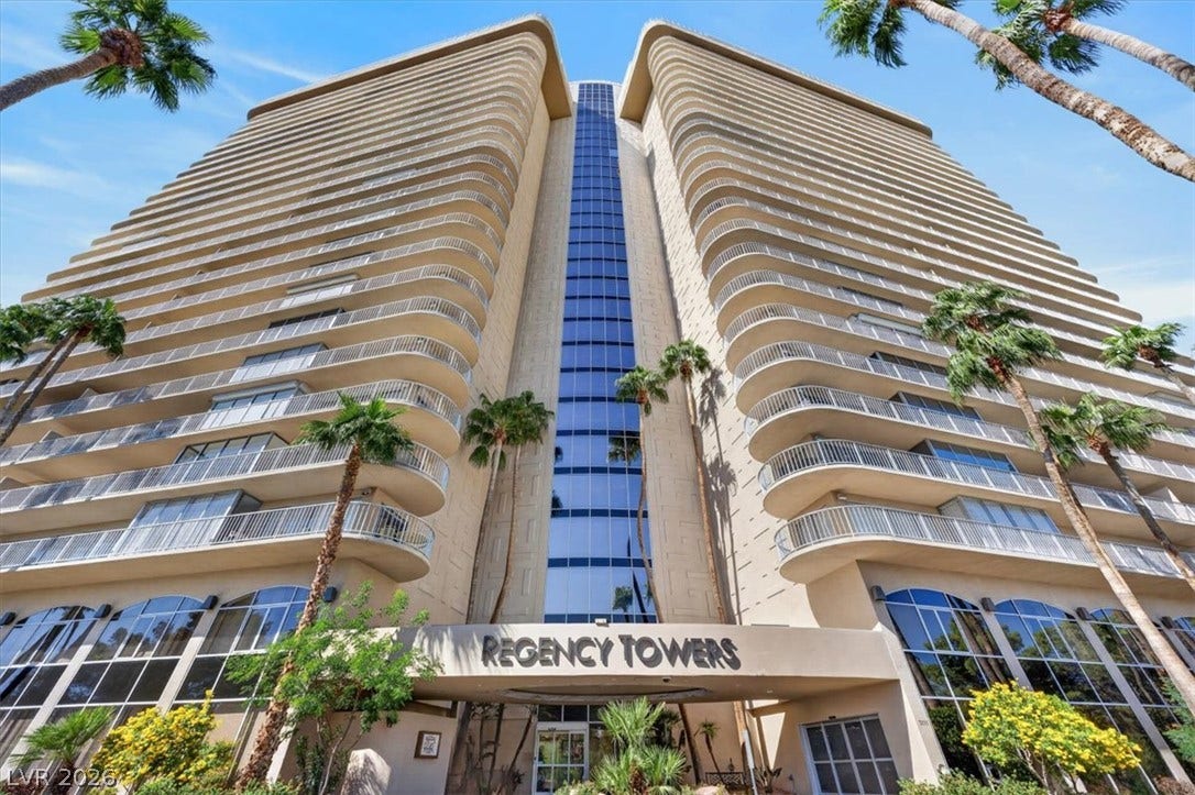 3111 Bel Air Drive, #7D, Las Vegas, NV 89109 Dramatic high-rise architecture features curved private balconies rising high above palm-lined grounds.