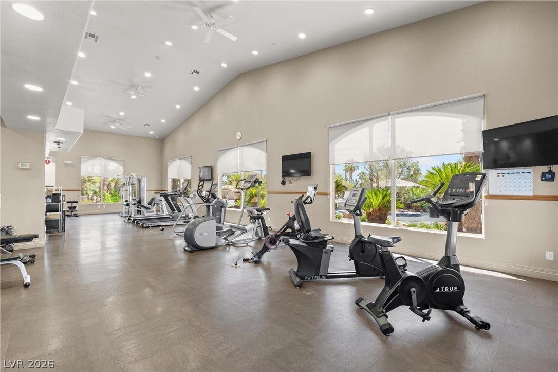 8175 Arville Street, #305, Las Vegas, NV 89139 High ceilings and expansive windows illuminate this spacious community fitness center.