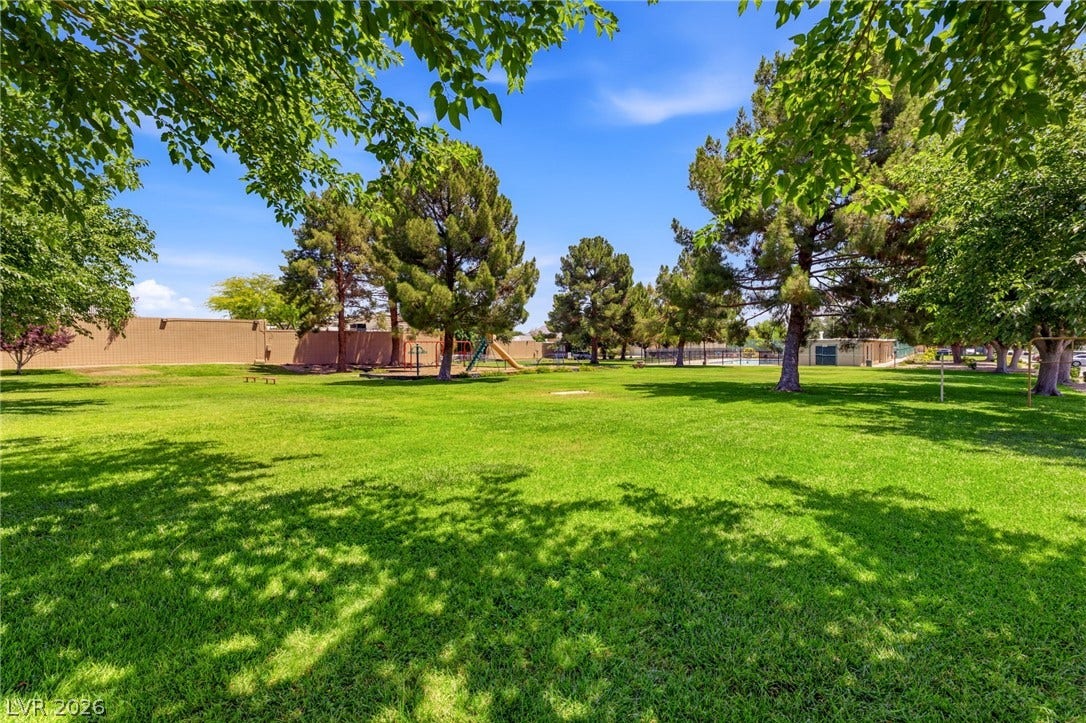 3471 One Nation Avenue, Las Vegas, NV 89121 A verdant community green space beckons for outdoor activities and relaxation.
