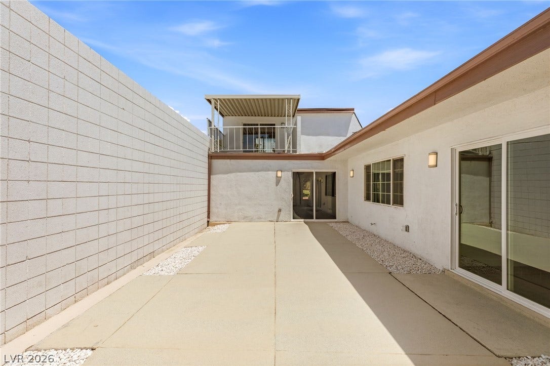 3471 One Nation Avenue, Las Vegas, NV 89121 A private outdoor space with a concrete patio, ideal for relaxing.