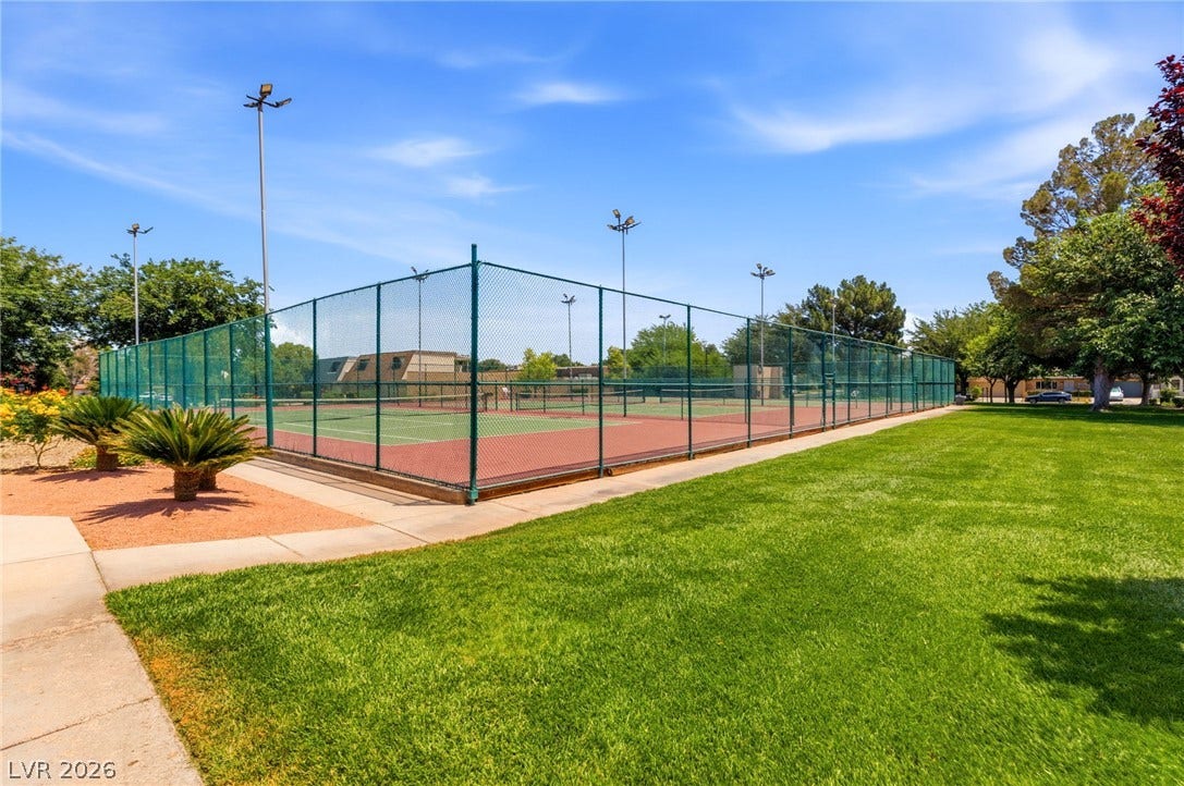 3471 One Nation Avenue, Las Vegas, NV 89121 Green courts invite competitive play, enclosed by fencing and surrounded by manicured grounds.