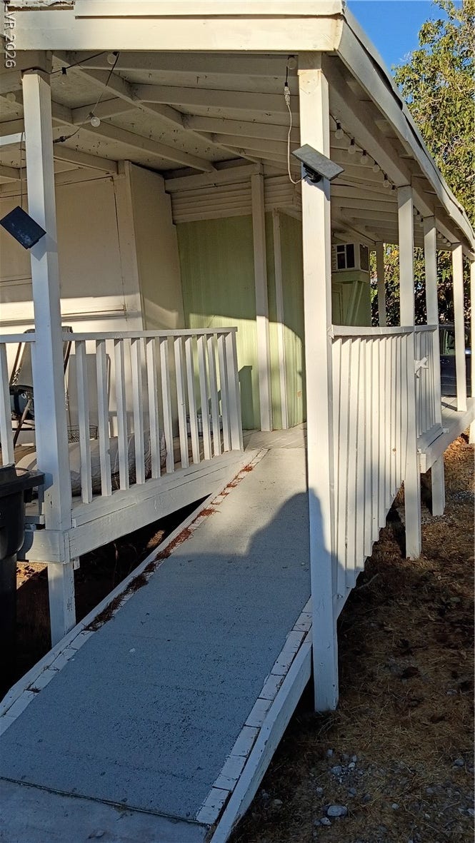 3490 E Savoy Boulevard, Pahrump, NV 89061 A ramp leads up to the covered porch of this home.
