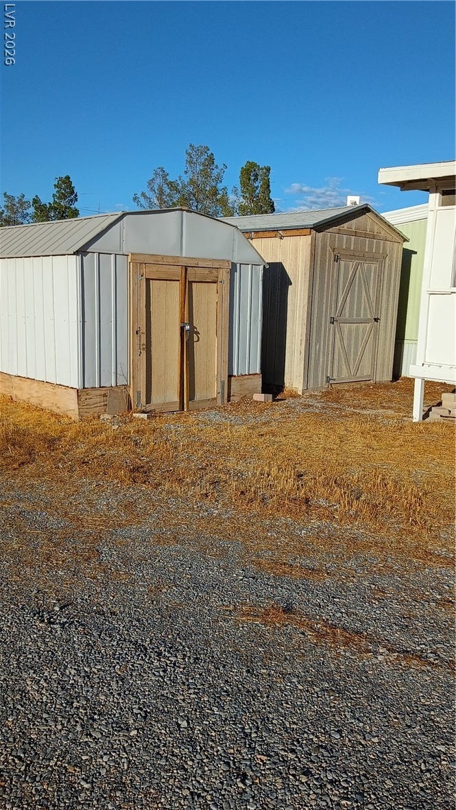 3490 E Savoy Boulevard, Pahrump, NV 89061 Two freestanding storage structures provide ample space for outdoor equipment and tools.