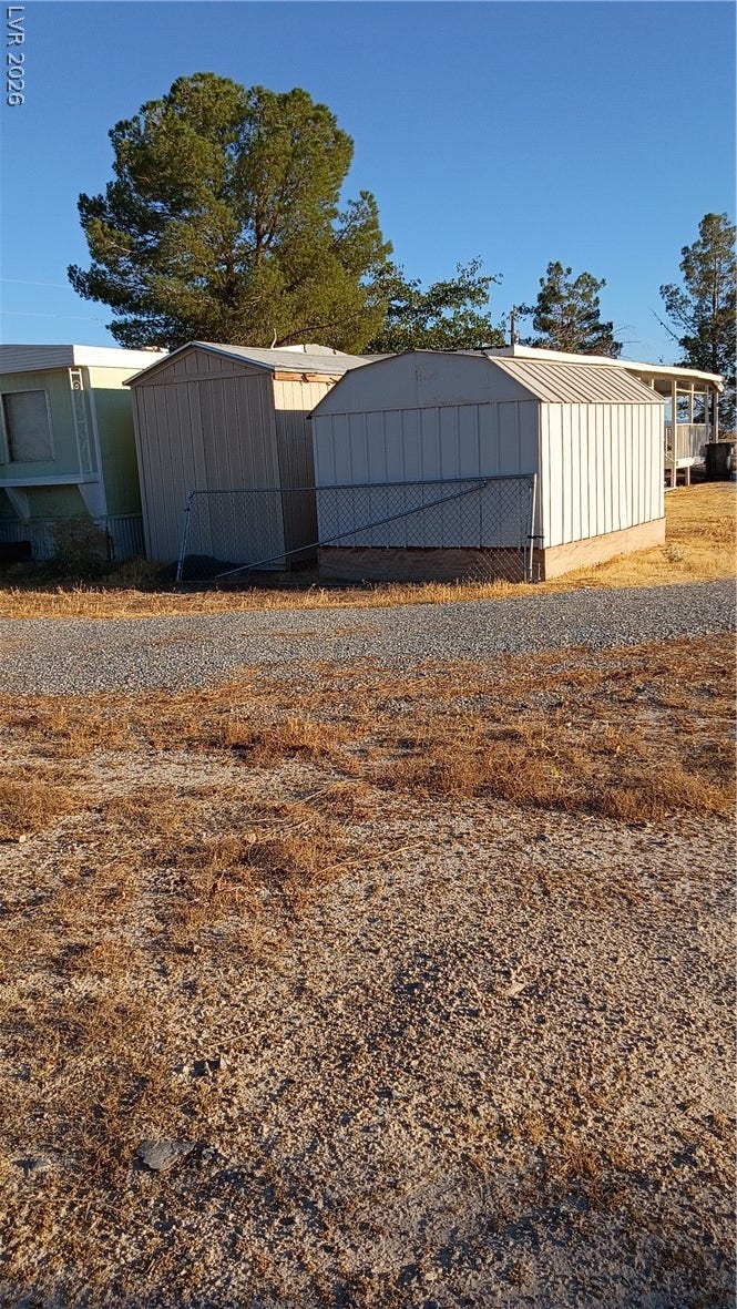 3490 E Savoy Boulevard, Pahrump, NV 89061 Functional outbuildings sit on the property, offering excellent external storage space.
