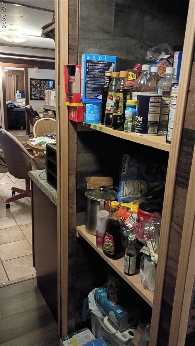 3490 E Savoy Boulevard, Pahrump, NV 89061 A built-in pantry provides convenient storage space adjacent to the kitchen.