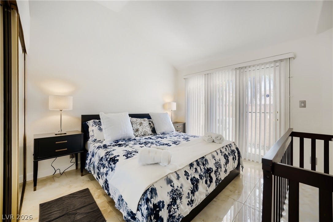 Guest bedroom downstairs with private patio