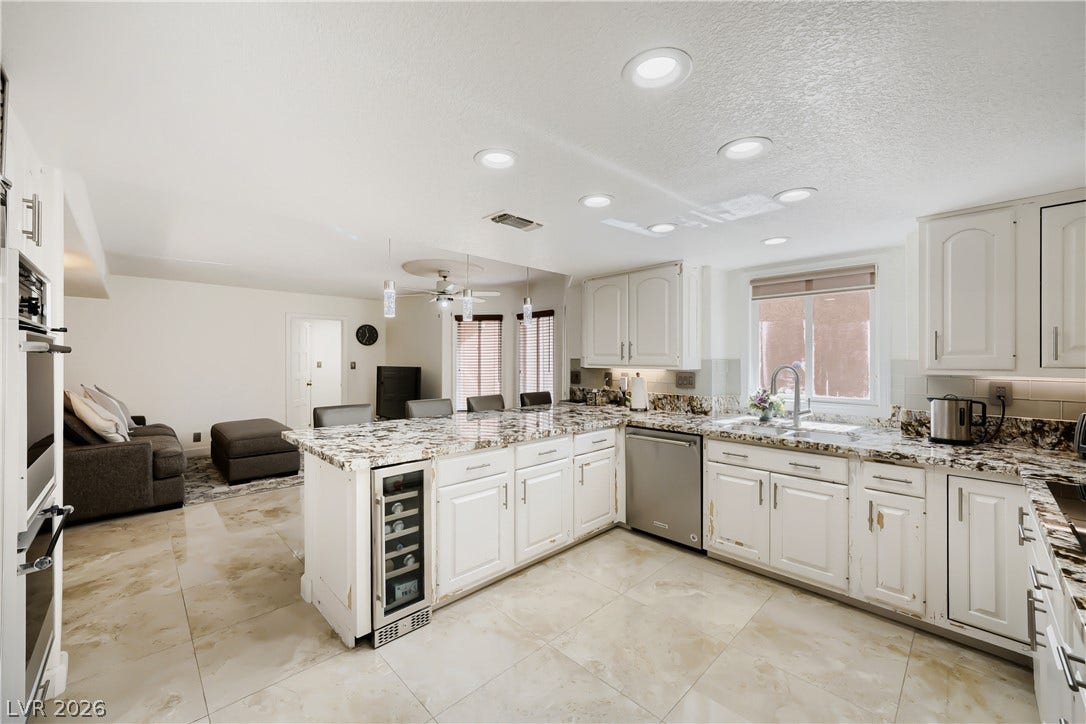 Kitchen looking into Family Room
