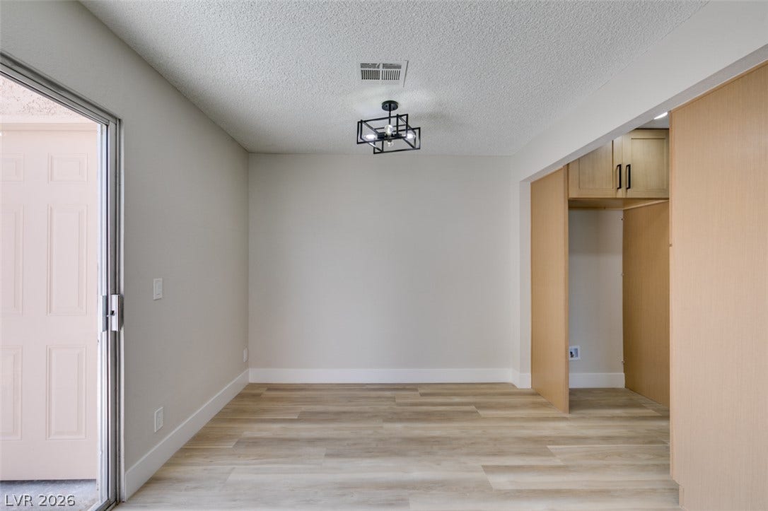 3638 Villa Knolls East Drive, Las Vegas, NV 89120 Sliding glass doors open from the dining area directly to the outdoors.