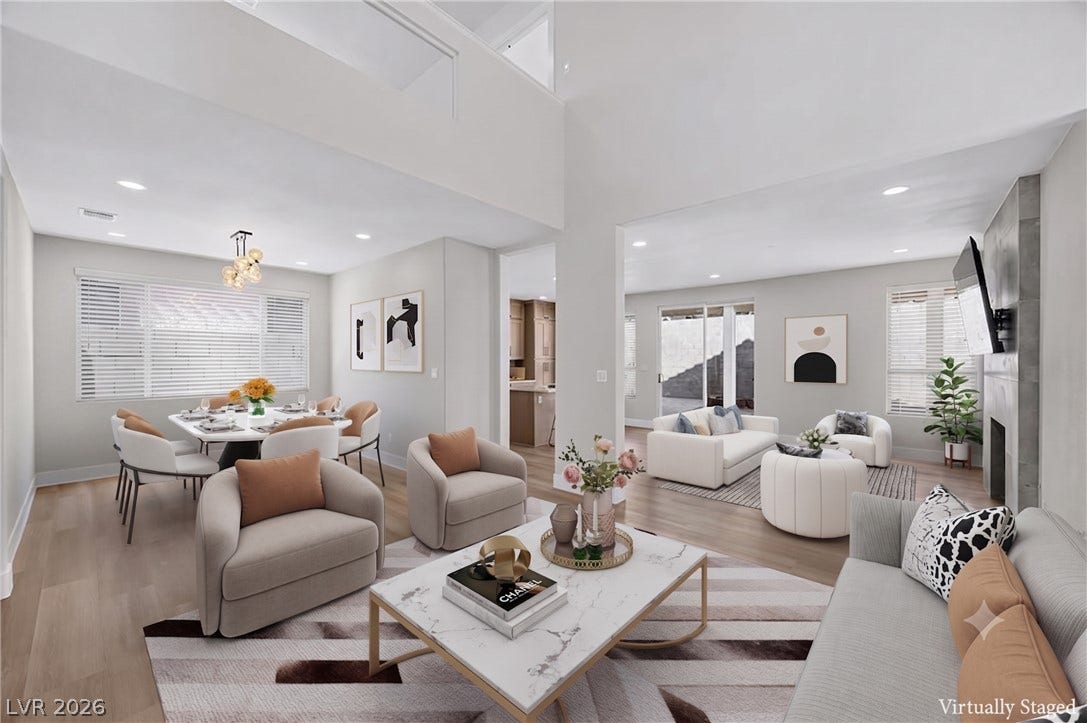 136 Villaggio Street, Henderson, NV 89074 Gleaming hardwood floors and recessed lighting enhance the open layout of this modern living space.