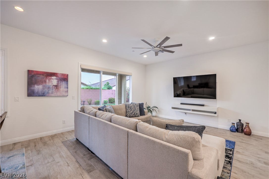 Great Room with Ceiling Fan, Recessed Lighting, Tile Flooring, and Floor Outlet