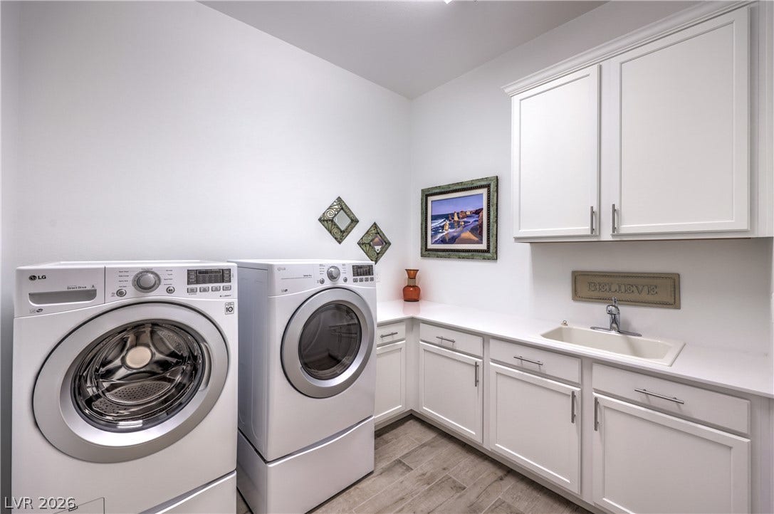 Laundry Room with Cabinets, Utility Sink and Washer & Dryer