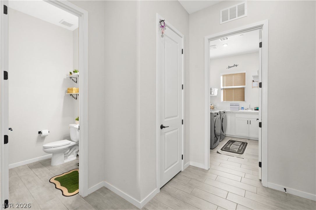 848 Purser Street, Henderson, NV 89011 An inviting hallway connects the main living spaces with clean lines and durable tile flooring.