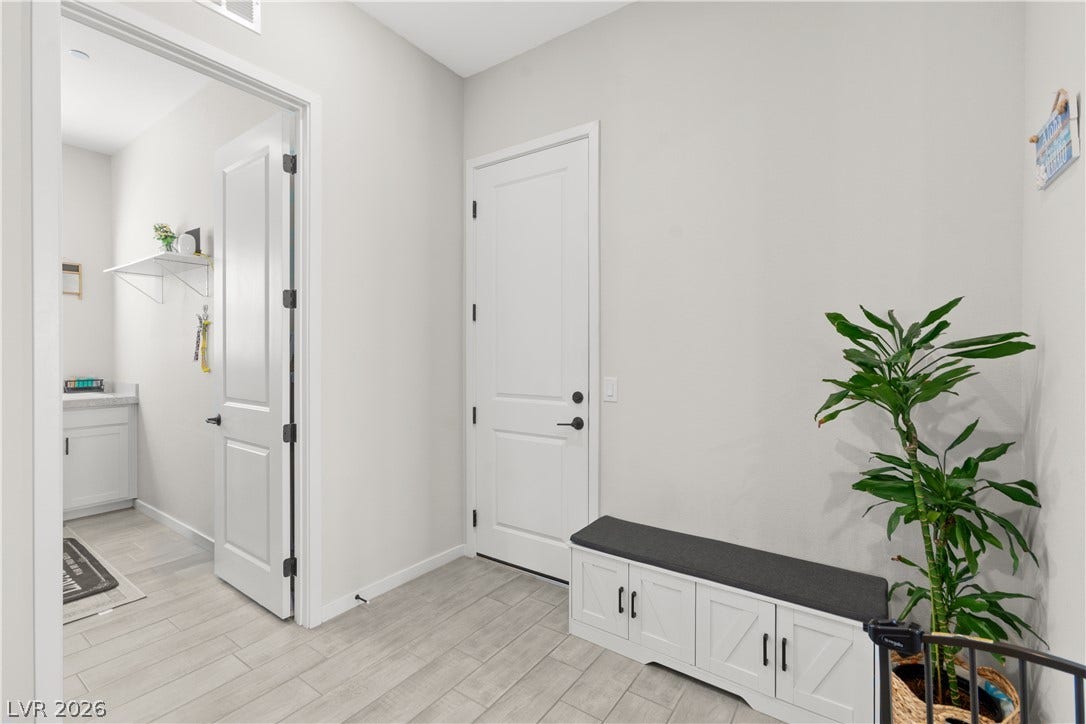 848 Purser Street, Henderson, NV 89011 Smooth tile flooring and clean lines define this versatile entryway space.