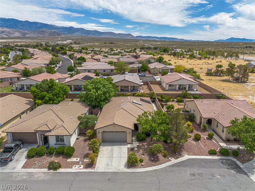 4911 S Castello Way, Pahrump, NV 89061 Desert mountains form a scenic backdrop for this single-story home nestled in a quiet cul-de-sac.
